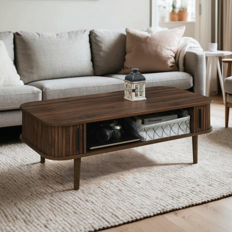 Aguilera 47.2" W Mid Century Coffee Table with Storage and Fluted Sliding Door, White Oak