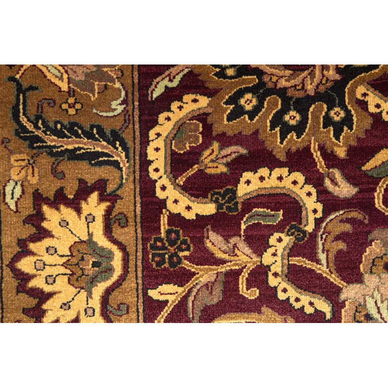 Tapis rouge et or de haute qualité noué à la main