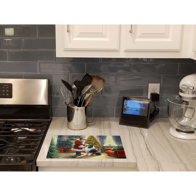 Collie and Santa Claus Glass Cutting Board