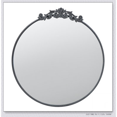 Miroir de conception classique avec forme ronde et cadre d'inspiration baroque pour salle de bain