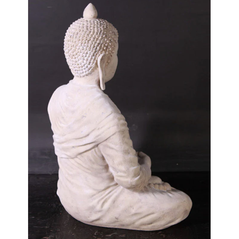 Statue de Bouddha divin assis en pierre