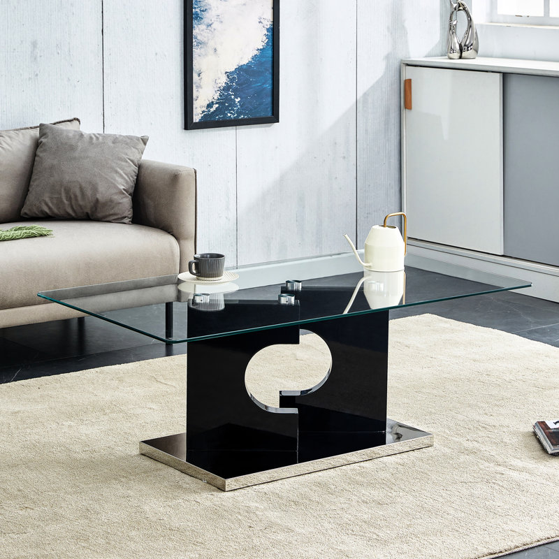 Rectangular Tempered Glass Coffee Table With Black Legs, Enhancing Living Room And Office Ambiance Ideal For Workspace