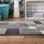Tapis gris / noir en polypropylène tissé à la machine Cassarah-729693721