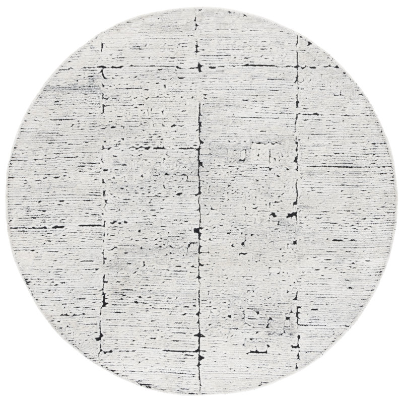Anindita Hand Tufted Wool/Cotton Rug in Black/Ivory, Round 6"