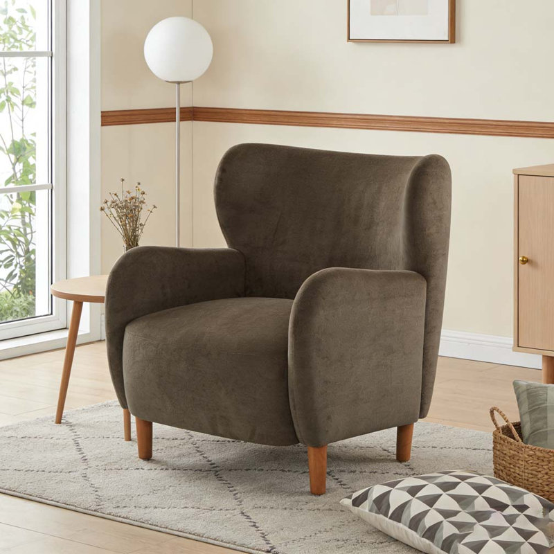 Fauteuil club rembourré à oreilles