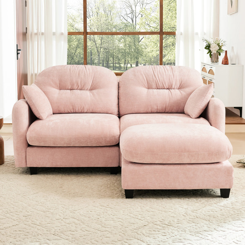 Canapé d'angle rose en chenille effet nuage, design ergonomique incurvé, idéal pour les coins de lecture, différentes configurations d'assise.