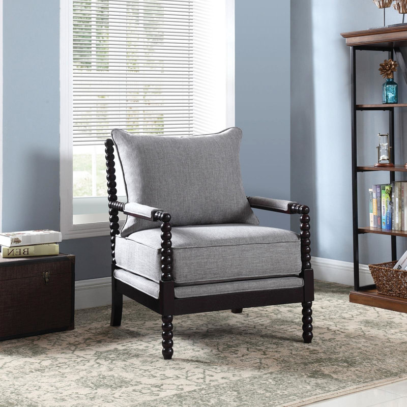 Chaise d'appoint sophistiquée grise avec une structure noire et un siège rembourré classique