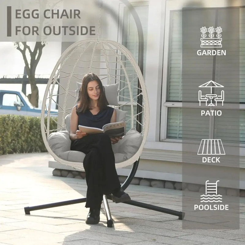 Fauteuil suspendu suspendu en osier résistant aux UV en forme d'œuf avec coussin amovible et support en acier, pour intérieur et extérieur.