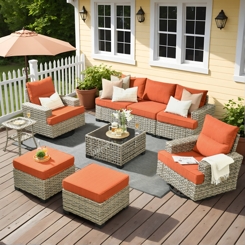 7- Person Rattan Outdoor Seating Group With Swivel Rockers, Orange Red