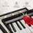 Rose On Piano Keys Canvas Print-102860517