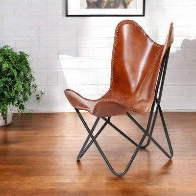  Fauteuil papillon brun en cuir véritable