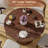48"W Round Dining Table with 2 Storage Shelves Seats 6
