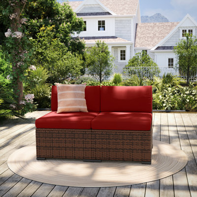 Chaise d'extérieur sans accoudoirs en osier avec coussins (ensemble de 2)
