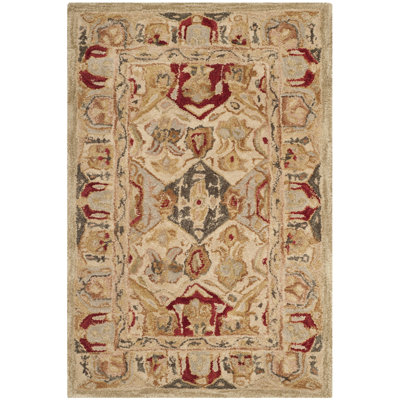 Breckan Oriental Handmade Tufted Wool Area Rug in Beige/Multi
