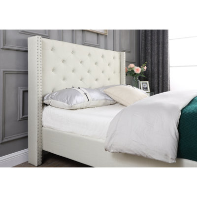 Upholstered Wingback Bed