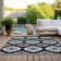 Malek Indoor/Outdoor Area Rug with Non-Slip Backing