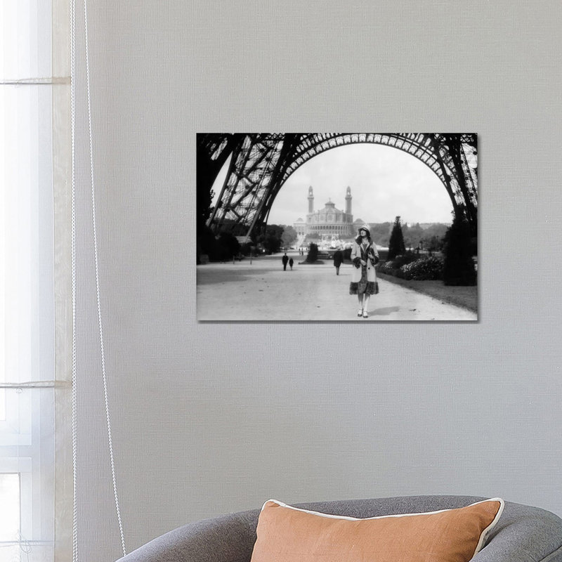 1920s Woman Walking Under The Eiffel Tower With The Trocadero In Background Paris France by Vintage Images - Wrapped Canvas Print