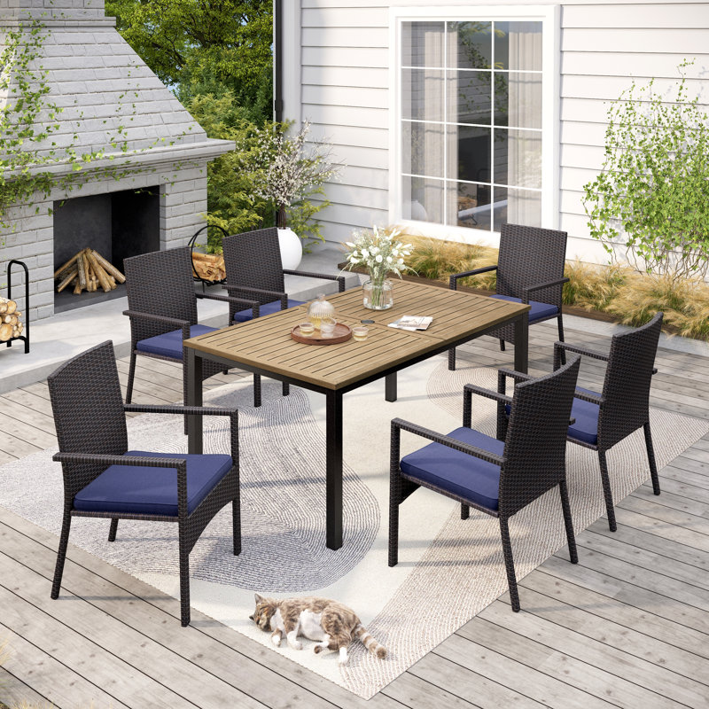 Rectangular 6 - Person 64" Long Dining Set With Cushions