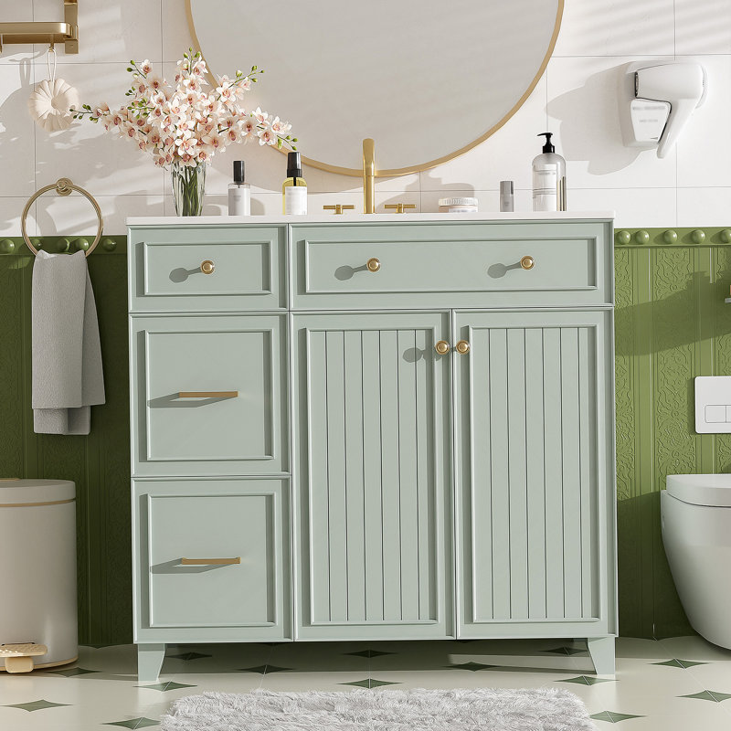Meuble-lavabo moderne avec lavabo en céramique, plusieurs tiroirs, tablettes réglables, portes à fermeture en douceur pour un rangement efficace dans les petites et moyennes salles de bain