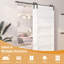 Portes de grange doubles en bois manufacturé avec panneaux de vagues-108647883-108647881