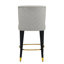 Le tabouret de 27 pouces au design moderne avec un tissu lisse et léger et un repose-pieds circulaire avec une finition dorée, crée un look sophistiqué et luxueux-41881666