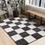 Tapis à damier noir / blanc Wum Collection-279142690-309903956