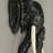 Sustainably sourced black hand-carved wood elephant head wall sculpture with painted finish and built-in hanger — 11" W x 5" D x 12" H