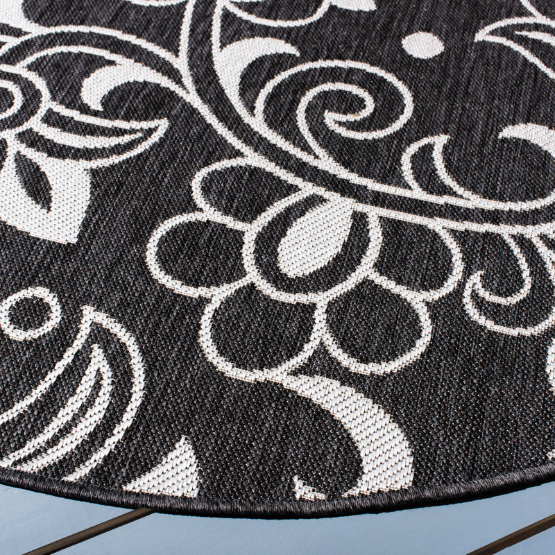 Jie Performance Floral Indoor/Outdoor Area Rug, Round 6'7"
