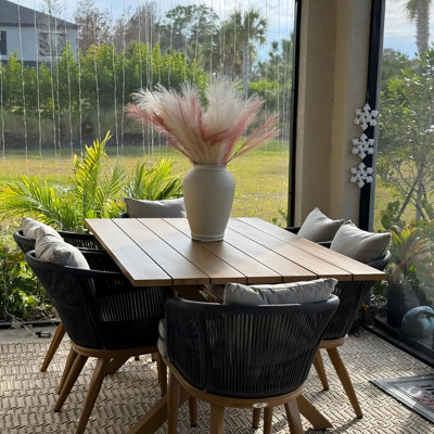 Braylin 6 - Person Wicker Patio Dining Set with Rectangular Table , Cushions Included
