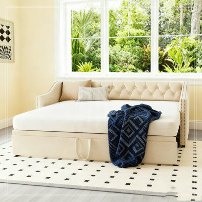 Upholstered daybed with Pop Up Trundle by Latitude Run