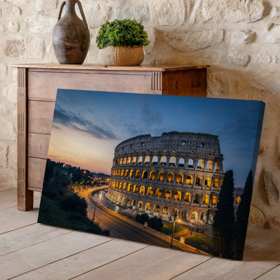 Canvas A Stunning View Of The Colosseum In Rome During Twilight Wall Art Showcasing Its Grand Architecture With Illuminated Arches Canvas Wall Art