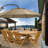 8 - Person Teak Wood Patio Dining Set with Extendable Oval Table , Cushions Included
