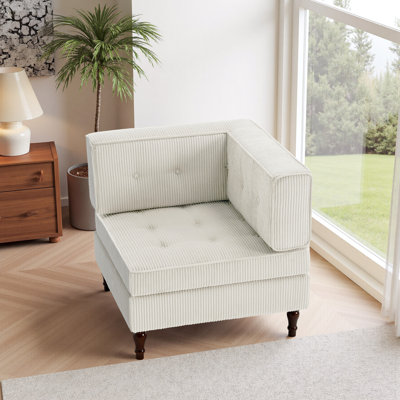 Fauteuil capitonné modulaire en velours côtelé