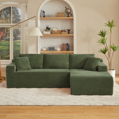 Canapés modulaires verts spacieux, tissu velours côtelé, confort de salon moderne