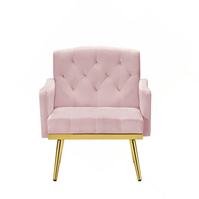 Fauteuil en velours rose avec pieds en métal