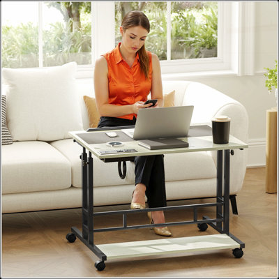 HOMCOM Adjustable Standing Desk with Power Outlets, Tiltable Tabletop, and Lockable Wheels for Enhanced Productivity and Comfort