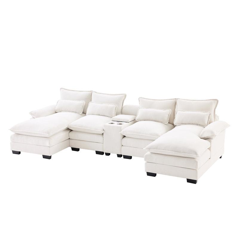 Console en chenille beige, avec double coussin et méridienne pour une structure offrant un confort supplémentaire