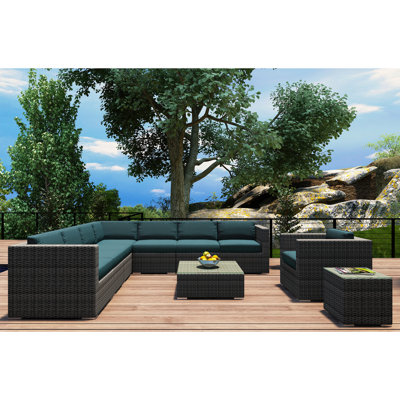 Suffern 10 Piece Rattan Sectional Seating Group with Sunbrella Cushions -  Wade LoganÂ®, 7DD807A9E507491BA0493D90E202F8FE