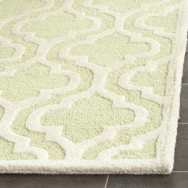 Handmade Light Green and Ivory Tufted Wool Round Rug