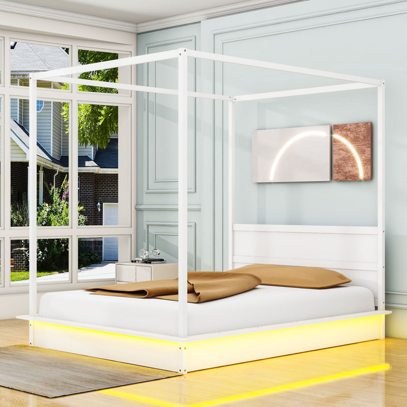 Lit plateforme à baldaquin en bois avec tête de lit Sarahjo, Grand