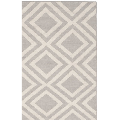 Tapis géométrique gris / ivoire en laine et en coton tissé à la main Brianna
