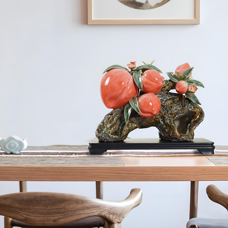 Œuvre en céramique délicate en forme de pêche pour le style intérieur