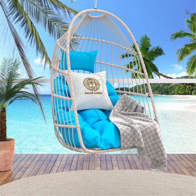 Fauteuil balançoire en rotin PE