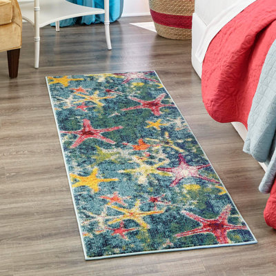 Tapis bleu marine à motif animalier Esposito