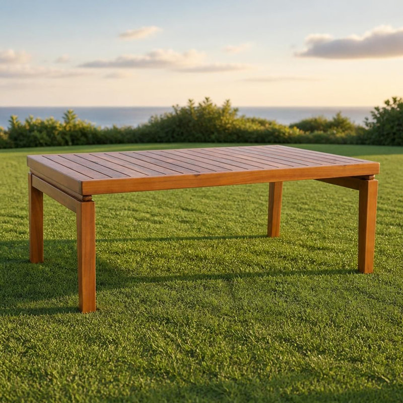 Table basse d'extérieur en bois d'acacia massif résistant aux intempéries avec plateau à lattes drainant l'eau, pieds fuselés renforcés et stables