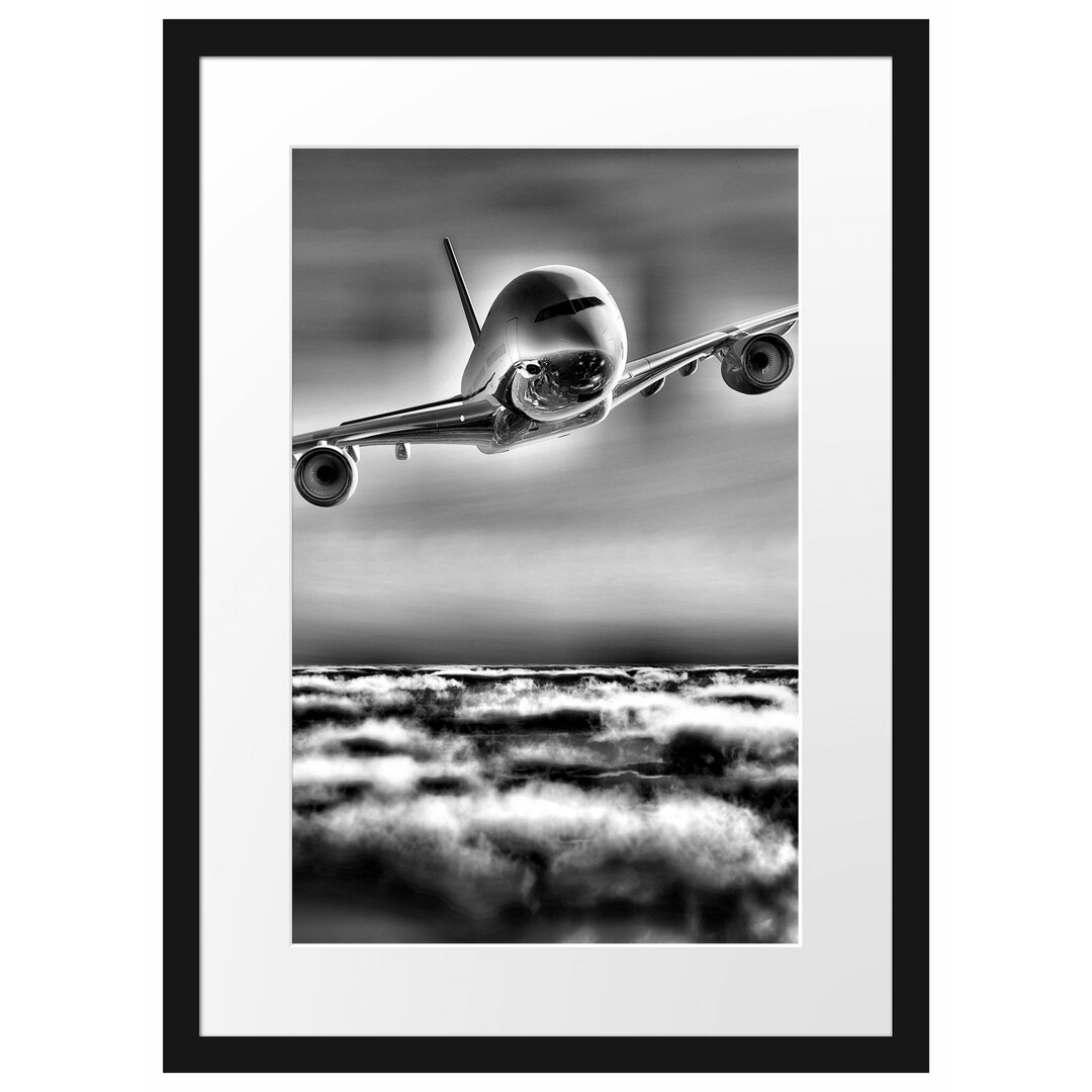 Gerahmtes Poster Flugzeug über den Wolken