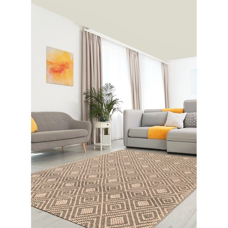 Tapis géométrique beige / gris en laine tressé à la main