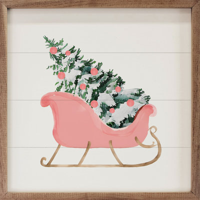 Traîneau rose avec arbre de Noël blanc