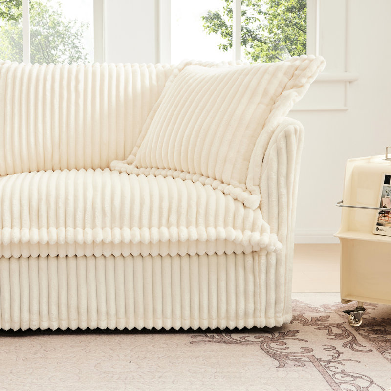Canapé quatre places en velours côtelé, housse amovible pour plus de commodité, assise extra profonde, confort optimal et élégance.