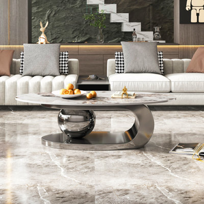 Table basse moderne en pierre frittée avec base en acier inoxydable - Centre de table de salon élégant